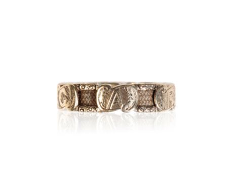 VICTORIAN REGARD RING, six scrolled panels spelling "REGARD", interspersed with panels of plated hair, on an unmarked yellow 