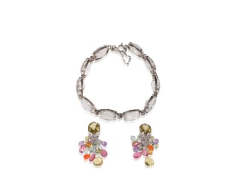 ROCK CRYSTAL BRACELET AND A PAIR OF TASSEL EARRINGS, the bracelet with ten oval faceted crystals, chain linked, with ring fas