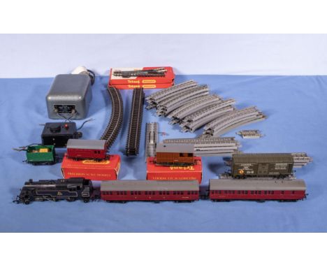 Triang Train set including engine, two carriages, four rolling stock, track and power unit