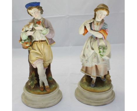 Two 19th Century continental bisque ceramic figures, one of a girl holding flowers, the other of a boy feeding a rabbit, both