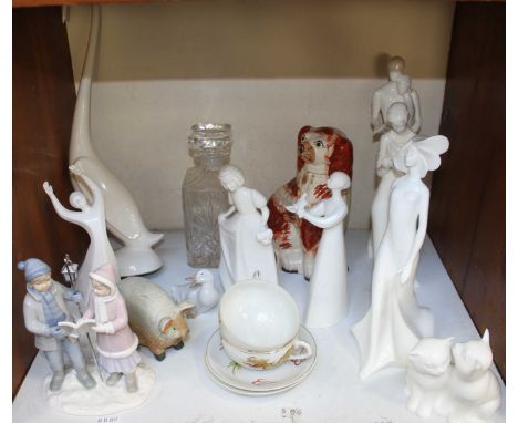 SECTION 10. Seven Royal Doulton ceramic figures (some AF) together with a Staffordshire pottery spaniel and a NAO duck etc.