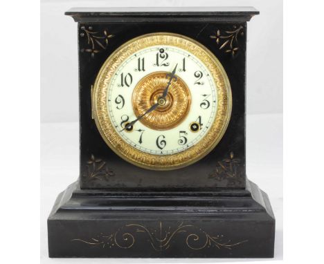A Victorian black slate mantel clock, the white dial with Arabic numerals denoting hours. 26cm high.