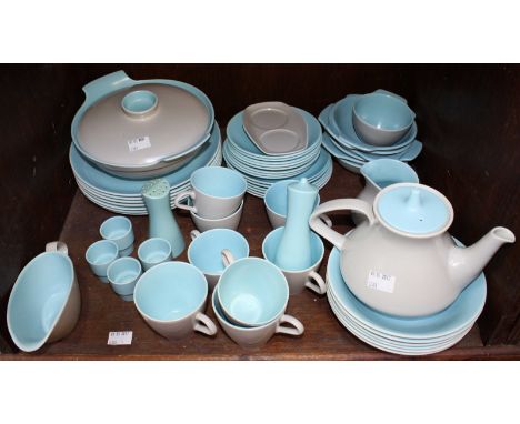 SECTION 44. An extensive Poole pottery tea and dinner service,  pale blue and eggshell in colour, set including tea pot, crue