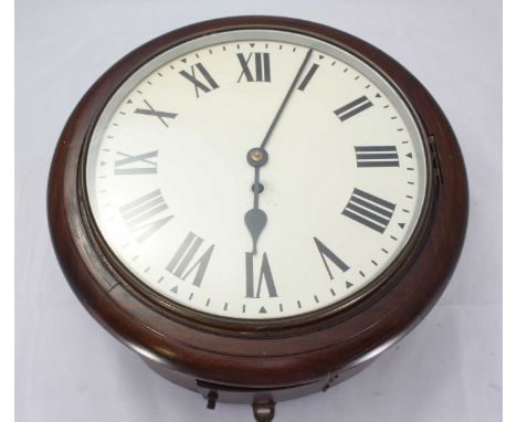 An early 20th century mahogany circular wall clock, the white dial with Roman numerals denoting hours and fusee movement. 39c