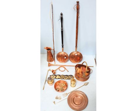 A collection of various Brass and Copperware items, including two bed pans, a hunting horn and another horn, horse brasses, a