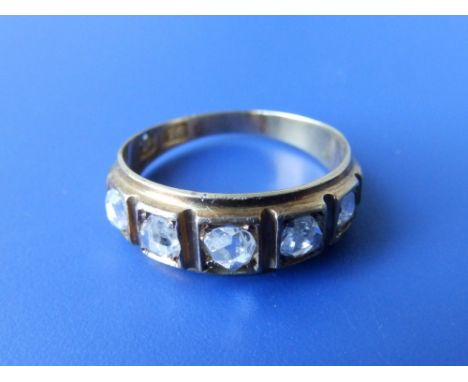A graduated five stone rose cut diamond ring. Finger size K.