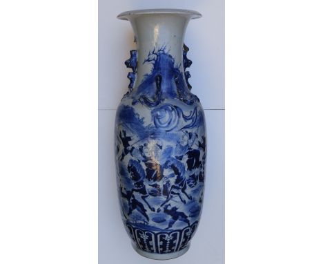 A 19thC Chinese blue & white porcelain warrior vase, having shishis and dragons moulded to the shoulders (with slight losses)