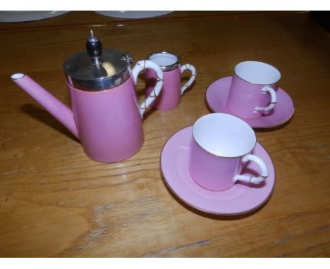 A four piece silver mounted Royal Worcester coffee set for two , Sheffield hallmarks for 1915 – coffee pot a/f.