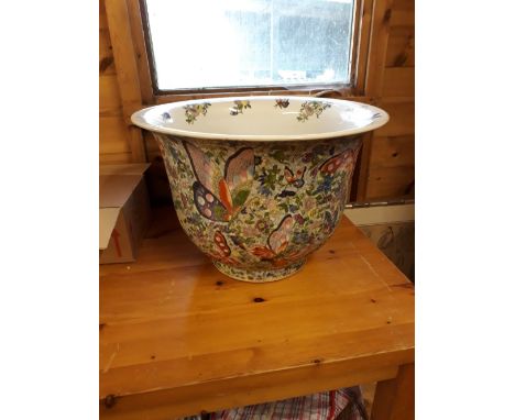 A 19thC Chinese famille verte porcelain fish bowl on wooden stand.famille verte porcelain fish bowl