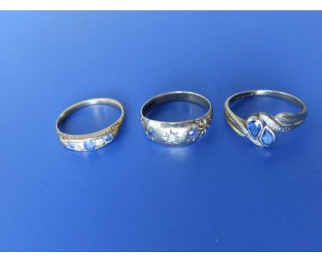 Two old sapphire & diamond set gold band rings and a 9ct ring. (3)