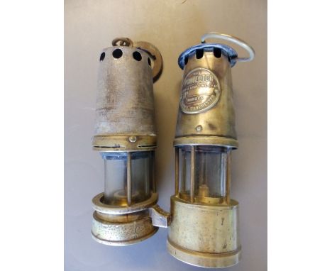 A 'Protector' miner's lamp by the Lamp & Lighting Co. and one other numbered '330'  (2)