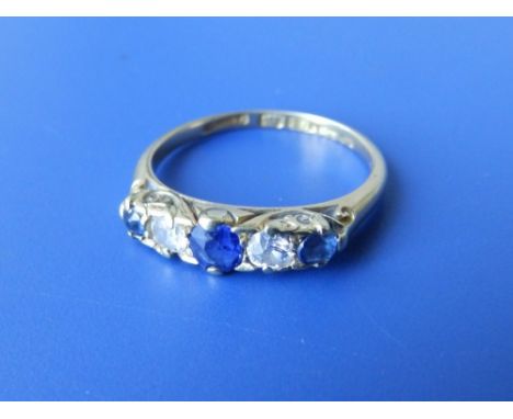 A five stone sapphire & diamond set 18ct gold ring. Finger size L/M