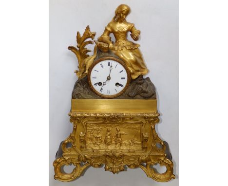 A 19thC parcel gilt French ormolu mantel clock striking on a bell, with silk pendulum suspension by Japy Freres, the convex w