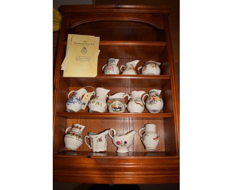 Twelve miniature Royal Worcester jugs from 'The Historic Jugs Collection', to include: The Sparrow Beak Jug; The Scratchcross
