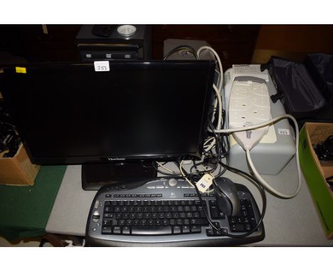 A Viewfonic computer VX2210MH-LED; a Logitech keyboard; an HP printer; a Dell ZYLUX multi media computer speaker system power