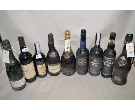 A bottle of Dom Ruinart Champagne 1985; Veuve Cliquot Ponsardin 1979; Green Point Australian Sparkling Wine 1994; and others,