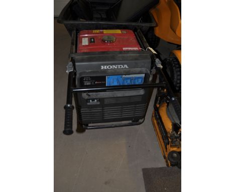 A Honda EN70IS generator with petrol engine and electric start.