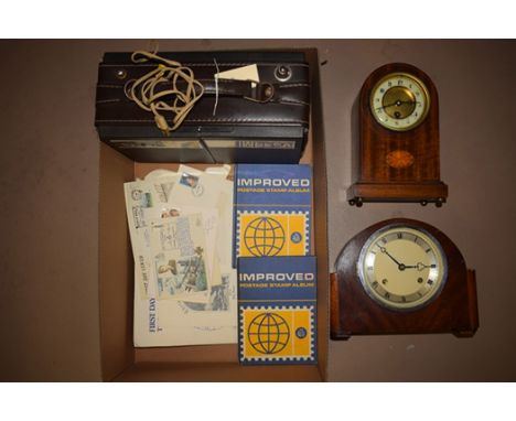 An Edwardian mantel clock in inlaid mahogany arched case; another mantel clock; and a late 20th Century portable short wave w
