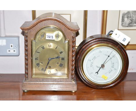 A Sestrel barometer, by Henry Browne & Sons; together with an oak cased mantel clock fitted Westminster chime.  (2)