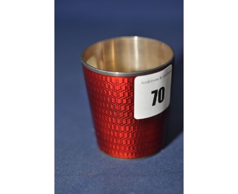 A Russian silver and red guilloche enamel vodka cup, by Mikhail Grachev, stamped to base (chip to enamel), 5.5cms high, 66.7g