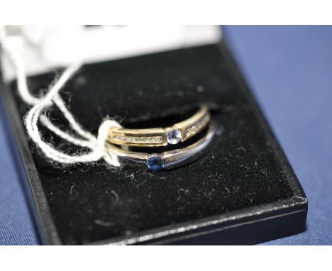 A tanzanite and diamond ring, on 9ct. yellow gold shank, ring size R; together with a sapphire ring, on 9ct. white gold ring,