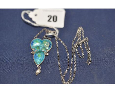 An Edwardian enamelled silver Arts & Crafts pendant, by C.V. & C., Birmingham 1908, of spade form, holding baroque pearl, on 
