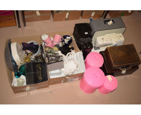A Toyota portable sewing machine; a Singer portable sewing machine; and a quantity of household ceramic; ornaments; storage j