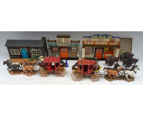 Britains two Concord Stage Coaches crew, passengers, a trunk and five sacks, a Ranch House, Gun and three Bison with two Wild