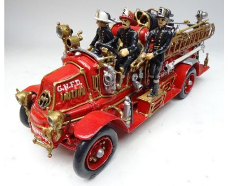 The Metal Shed, 1918 Mack Fire Engine 'Great Neck Fire Department' 1/32 scale with crew of six in original box (Condition Exc