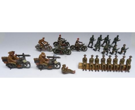 Britains, eight RARE seated Men in steel helmets sold singly by Britains to act as passengers in army lorries (Condition Very