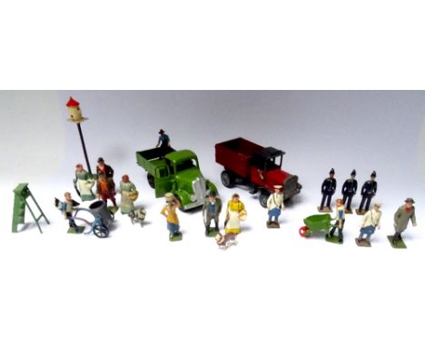 Britains Farm People and a few other items twelve Farm People, step ladder, Dovecote, waterbin, wheel barrow, three Policemen