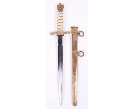 WW2 German Kriegsmarine Naval Officers Dress Dagger, gilt eagle and swastika pommel, white celluloid grip retaining the wire 