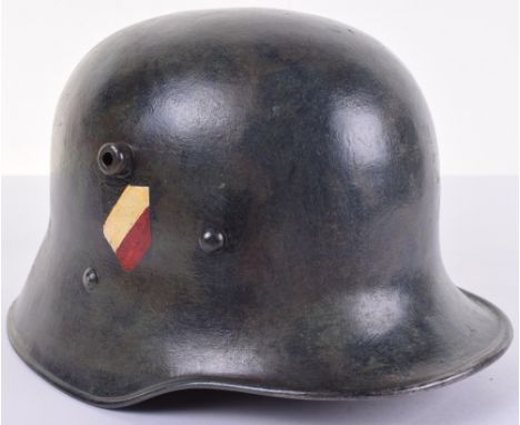 Austrian M-17 Steel Helmet, being a example issued to the Austrian police with the two small drill holes for the fitting of t