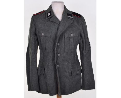 Waffen-SS M-37 Combat Tunic, fine example of the green wool M-37 pattern combat tunic as issued to soldiers of the Waffen-SS.