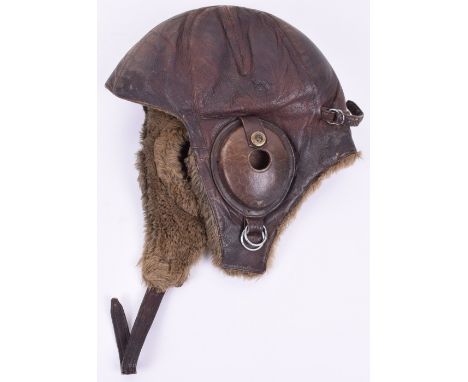 WW2 Japanese Winter Issue Flying Helmet, brown leather example with wool lining to the interior. Complete with its leather ea