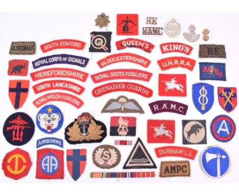 Grouping of Cloth and Metal Badges and Insignia, including embroidered EIIR Royal Navy Officers cap badge, embroidered Herefo