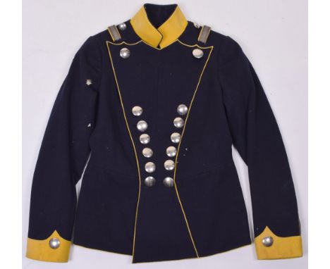 Imperial German Uhlan Tunic for a Child, dark blue cloth with yellow Polish style cuffs and stand up collar. Plated plain cir