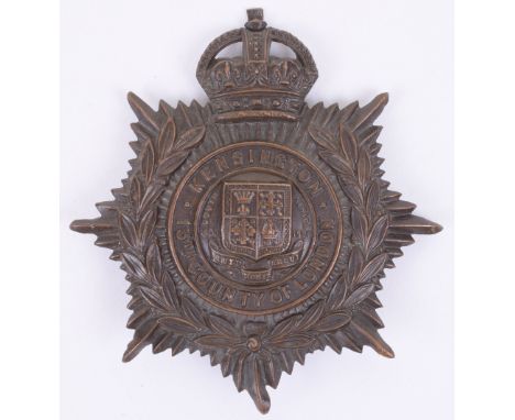 Post 1908 13th (Kensington) County of London Regiment Helmet Plate, bronzed example with two lug fittings remaining to the re