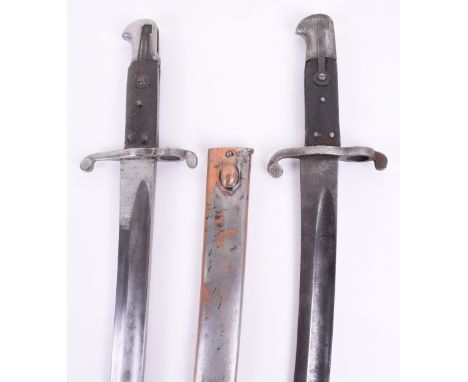 British 1856 Pattern Bayonet, housed in a steel scabbard, Yataghan blade with fuller and remains of the markings. Two piece c