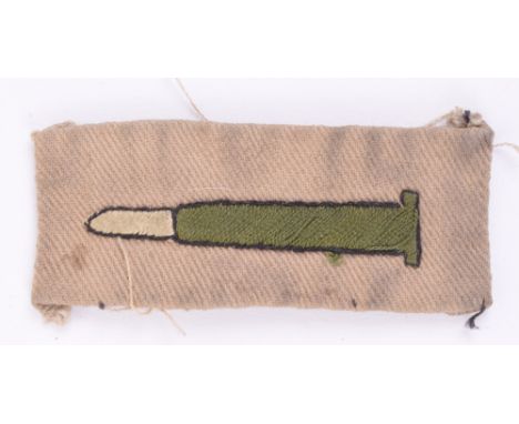 WW1 Volunteer Training Corps (V.T.C) First Class Shot Badge, embroidered bullet on khaki cloth rectangle. Good uniform remove