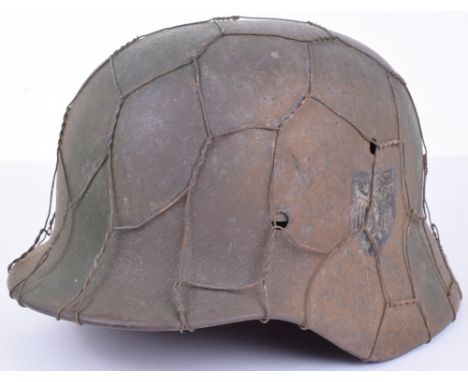 WW2 German Army Normandy Camouflaged Single Decal Steel Combat Helmet, untouched example of a M-40 pattern combat helmet whic