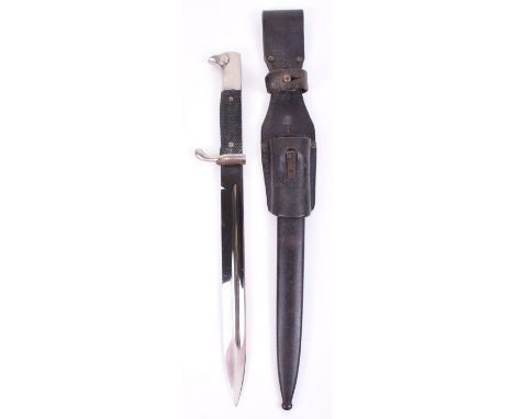 German Army Parade Bayonet by Carl Eickhorn, with two piece black chequered grips and plated eagle head top and cross guard. 