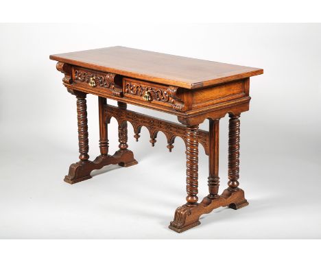 A Renaissance style oak console table, rectangular bonded top over two frieze drawers with leaf scroll carving and flanked by