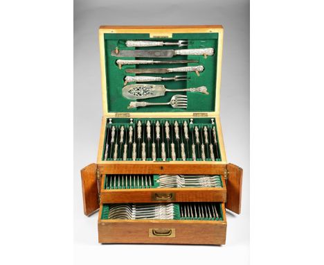 Oak canteen of George V silver cutlery, hinged lid over two fitted drawers, fitted with five piece carver set, pair of fish s