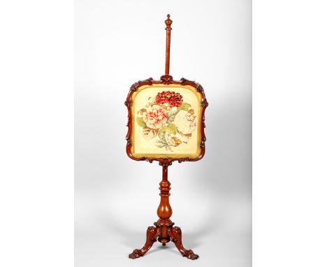 Victorian mahogany polescreen with an adjustable floral sewn work panel raised on a turned pole with a tripod base with three