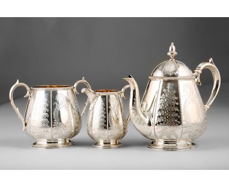 Victorian three piece silver tea service, chased floral decoration, Assay marked London 1875 by Thomas Bradbury and Sons, 41o