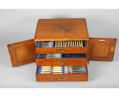 Oak canteen of George V silver cutlery, canteen with three fitted drawers, fitted with five piece bone handled steel carving 