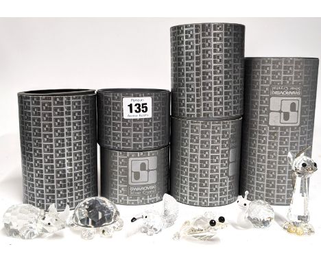 Swarovski Crystal Glass, a mixed collection including 'Anteater', 'Clear &amp; Frosted Glass Snail', etc, boxed. (8) (yellow 