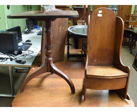 A 19th century oak childs commode rocking chair, a George III mahogany flip-top tripod table; and a late Victorian tub shaped