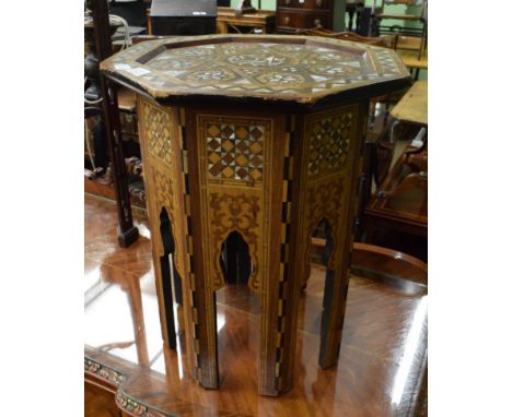 A Middle Eastern mother of pearl inlaid occasional table